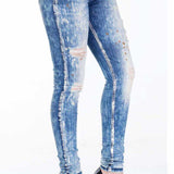 WD211A jeansy damskie slim fit z przetarciami