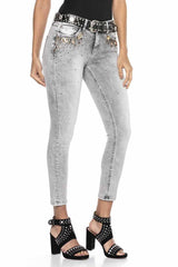WD407 Mujeres Jeans delgados con un gran recorte de piedra en ajuste delgado